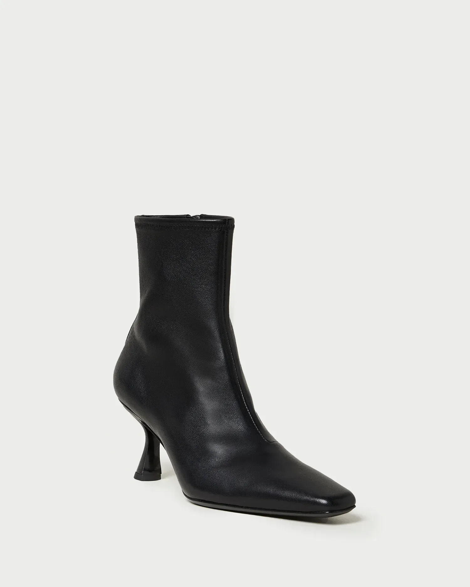 Thandy Black Leather Curved Heel Bootie