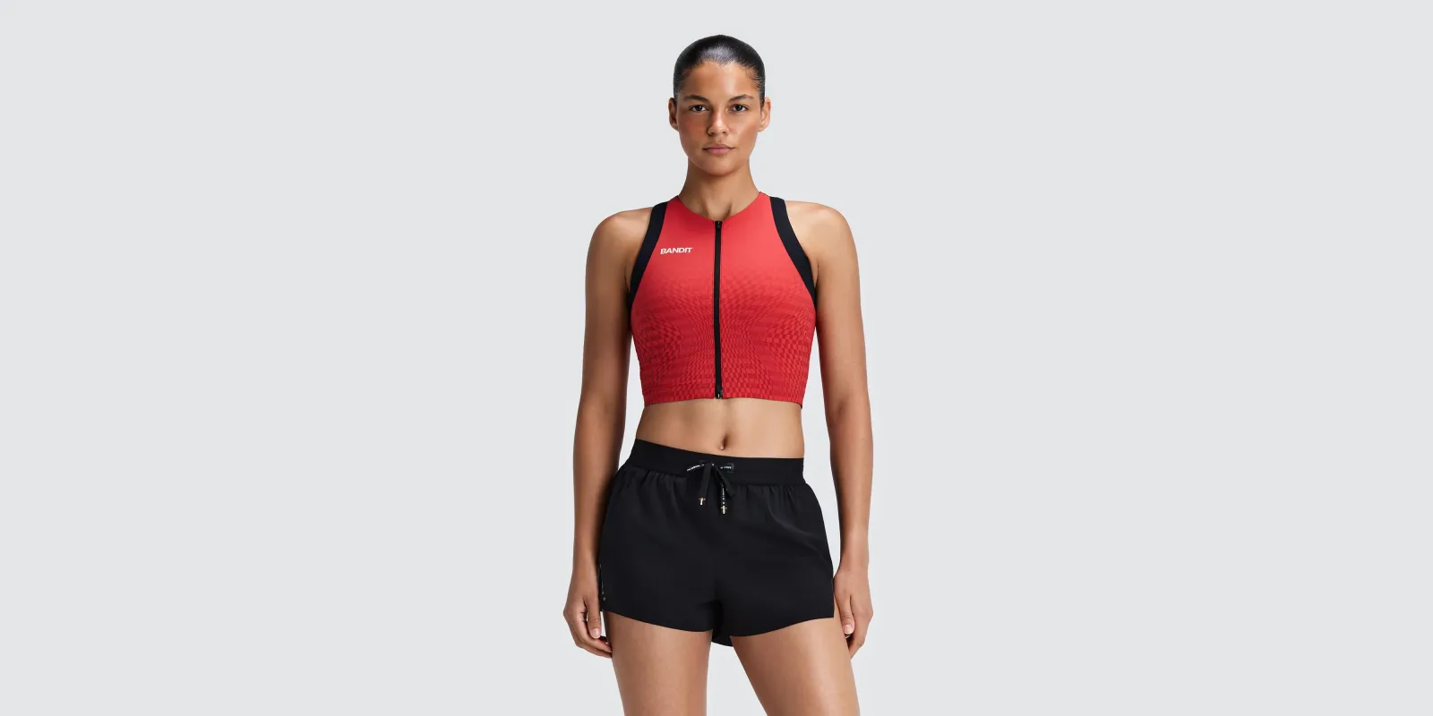 Women's Adapto™ 2-Way Zip Race Crop – Oxide Red