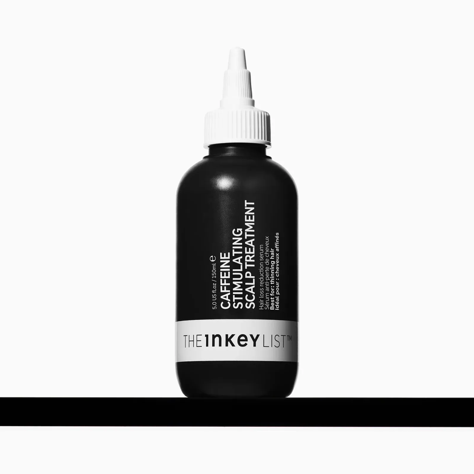 Caffeine stimulating scalp treatment