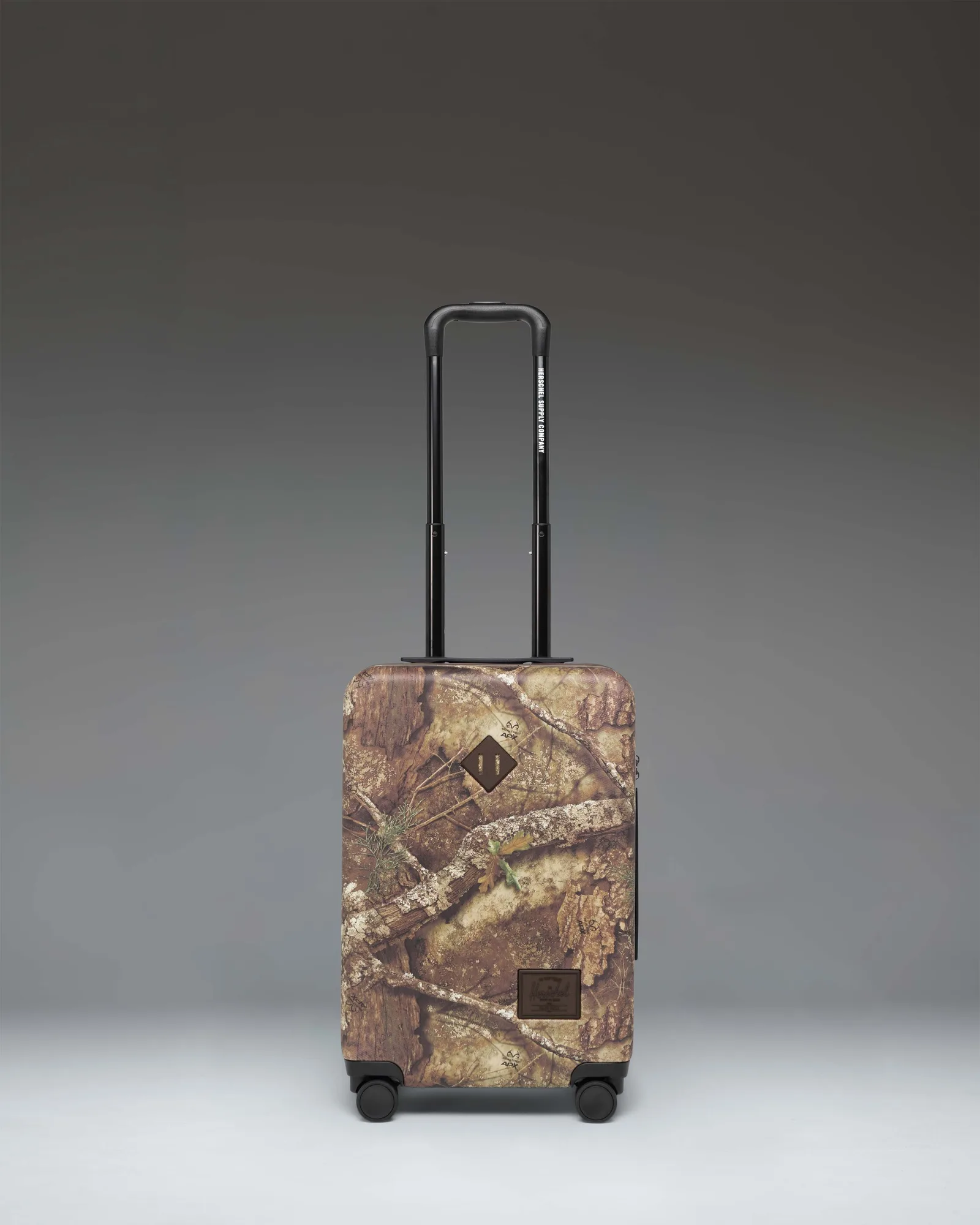 Realtree® Herschel Heritage™ Large CO Luggage