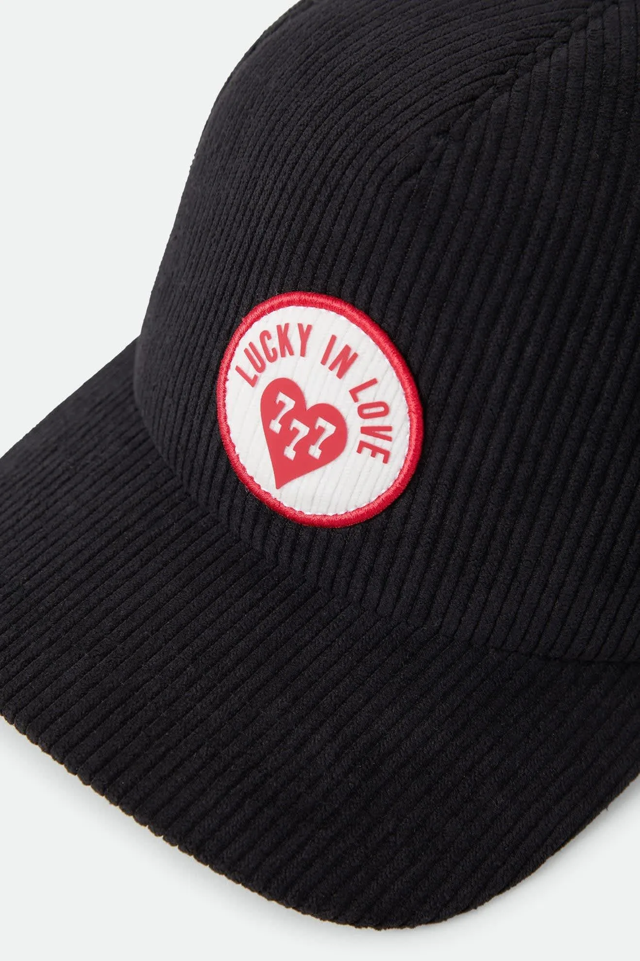 Lucky In Love Trucker Hat – Black