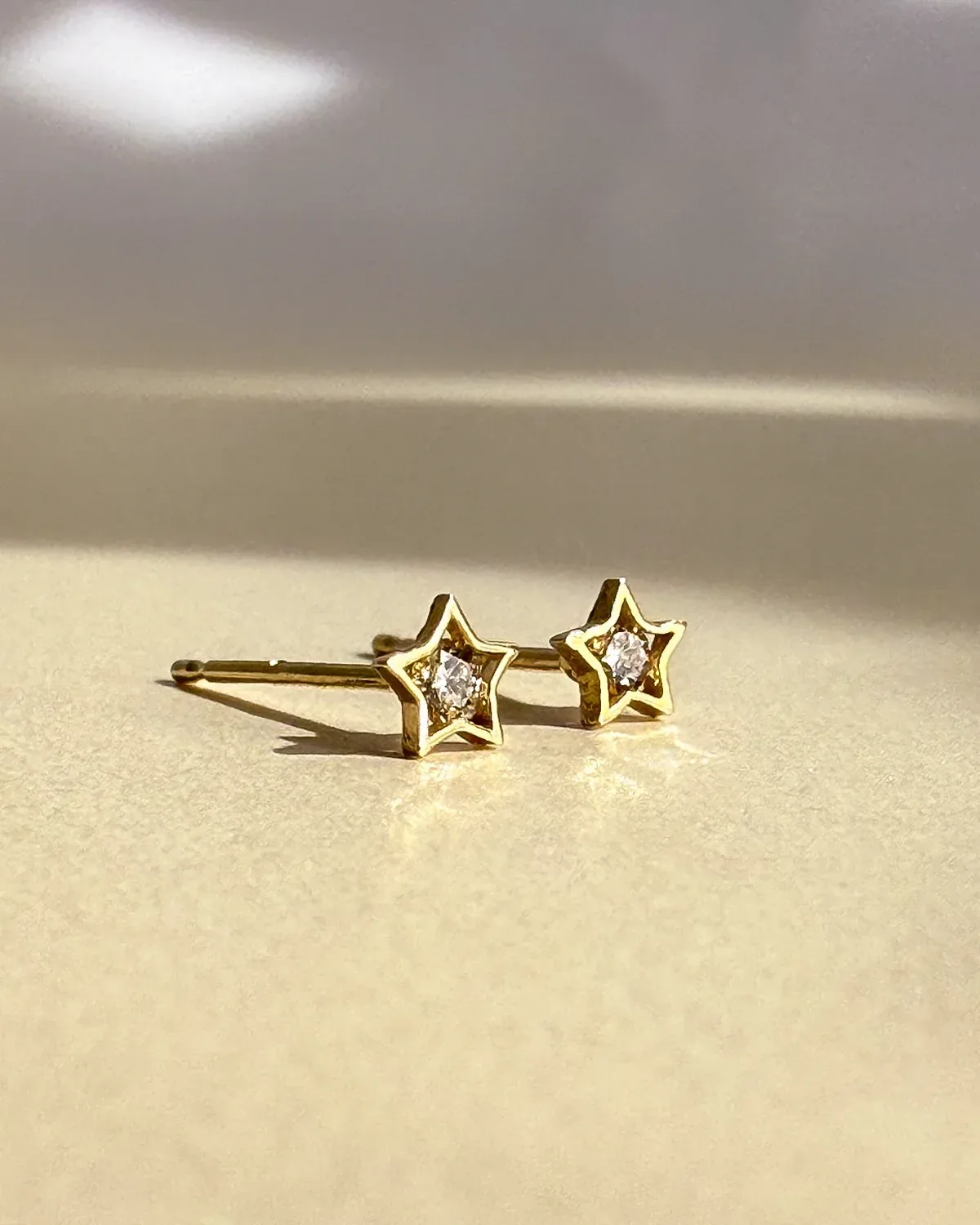 14k Gold Tiny Diamond Star Stud Earrings